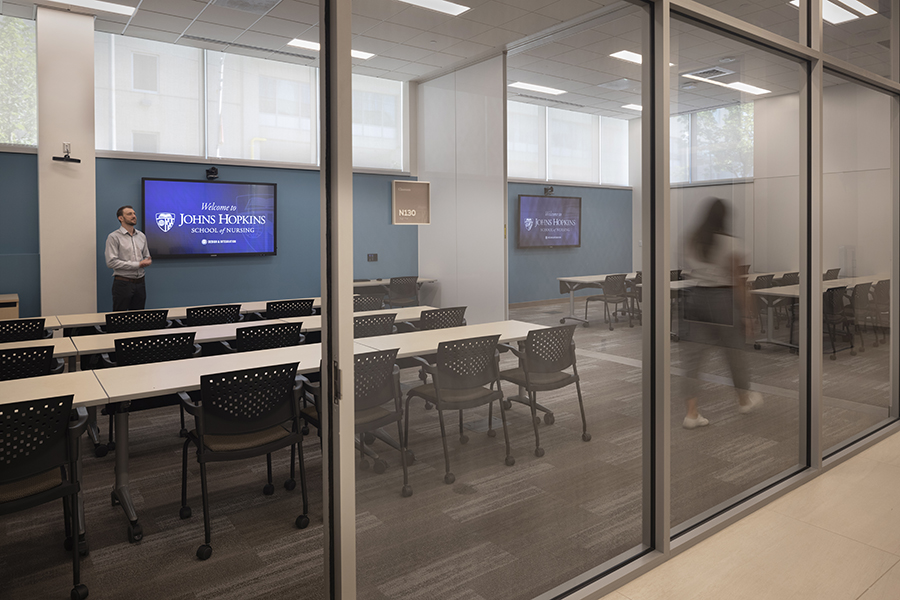 A classroom at Johns Hopkins School of Nursing with a television display