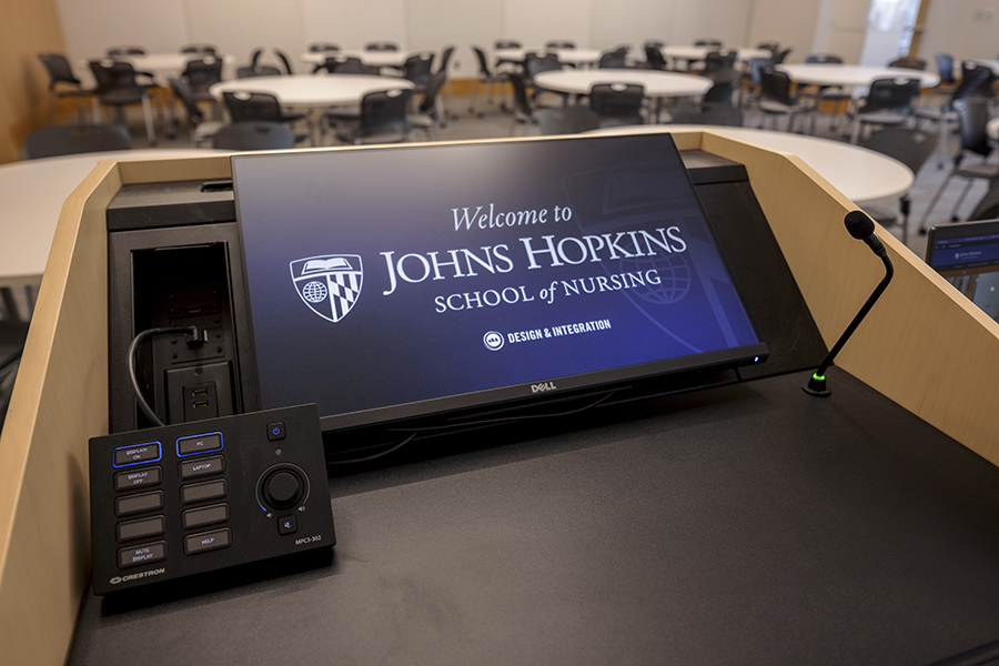 Lectern touch panel at Johns Hopkins School of Nursing with custom graphics