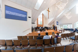 Alexandria Presbyterian Church Sanctuary with scripture subtitles on the display